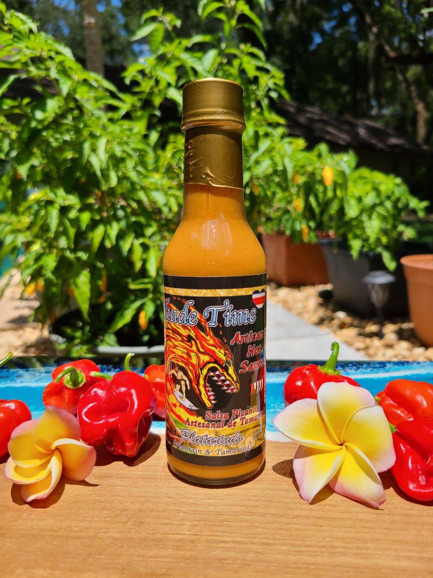 "Platarindo hot sauce bottle with plantains and tamarind fruit"