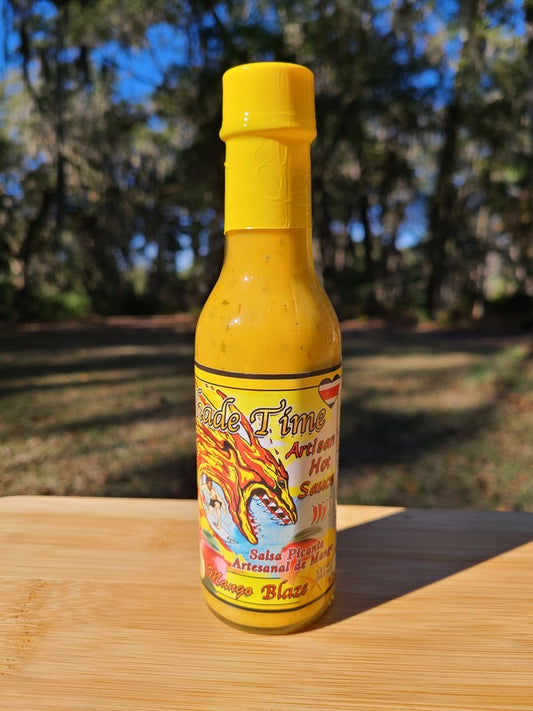 Mango Blaze hot sauce bottle with mangoes and habanero peppers