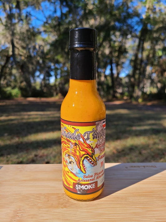 Bottle of Smoke hot sauce with smoked Scotch Bonnet peppers