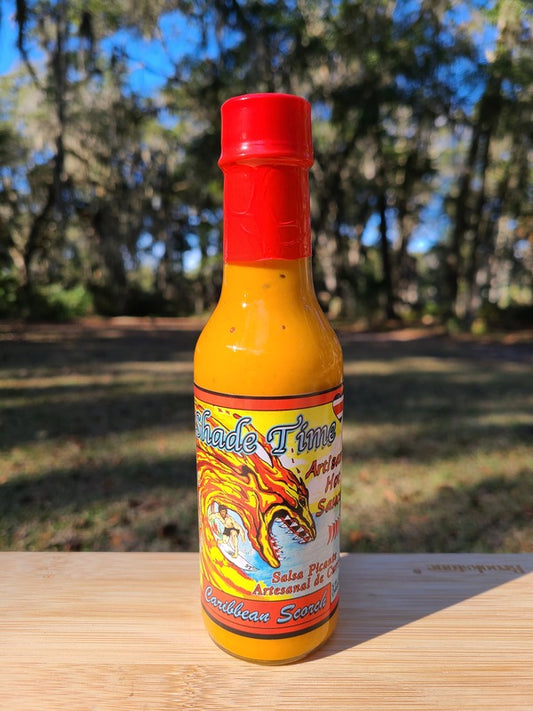 Bottle of Caribbean Scorch hot sauce with curry spices and chiles